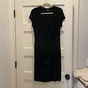 Flattering black Nic & Zoe dress w/ cap sleeves, scoop neck & side twist detail